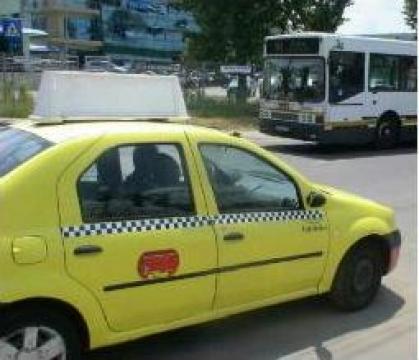Publicitate pe taxi de la Evia Media