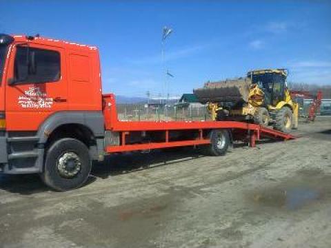 Transport buldoexcavator