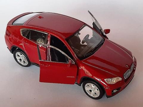 Macheta auto BMW X6 rosu scara 1 34 - 1 39 Welly